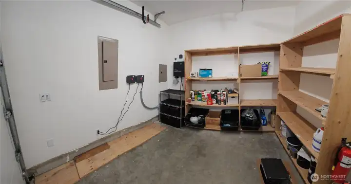 Additional garage storage, elec panel, Solar panel interface.