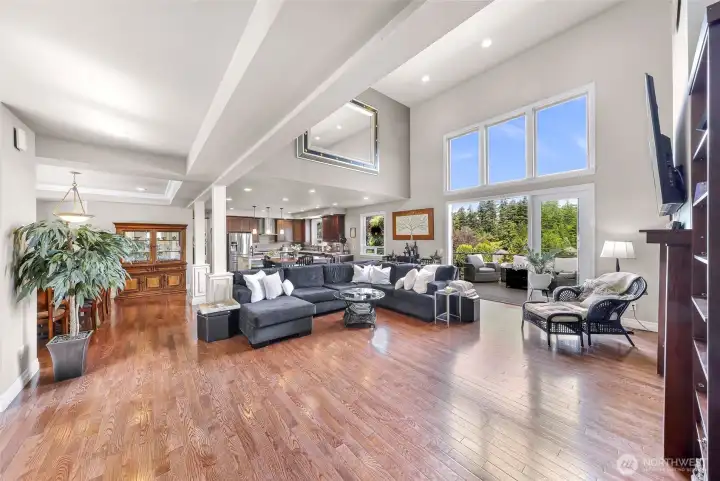 Open floor plan main living room and kithchen with vaulted ceilings