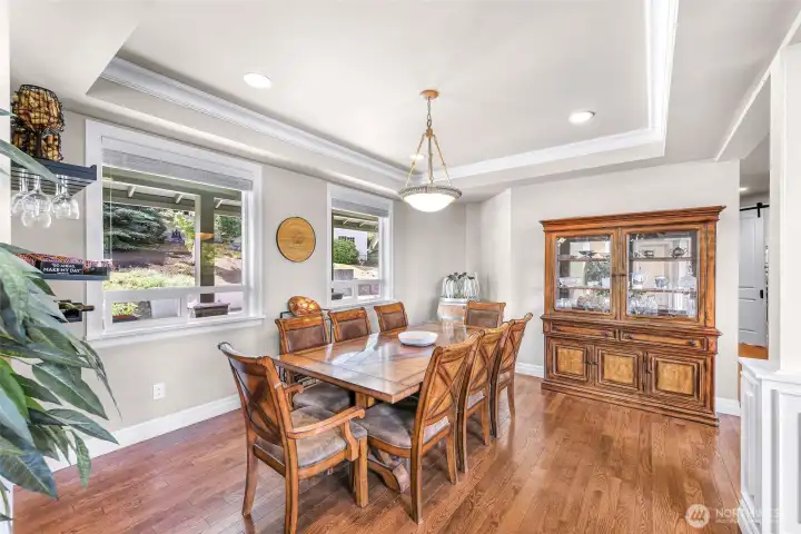 Formal Dining room with coffered ceilings