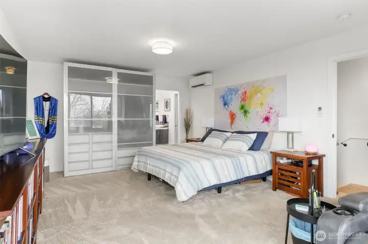 The primary bedroom is spacious and comfortable with upgraded carpet and thick padding.