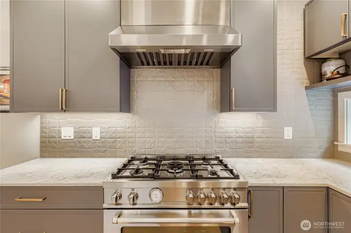 Main Floor Kitchen- High end appliances and finishes