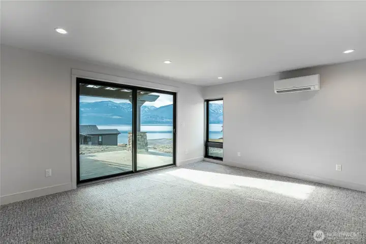 Second bedroom is large enough for a king size bed and also features an en suite bathroom. Great for two couples or additional guests.