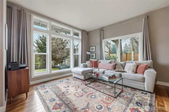 The amazing wood-wrapped windows seem to bring the outdoors "in"!!