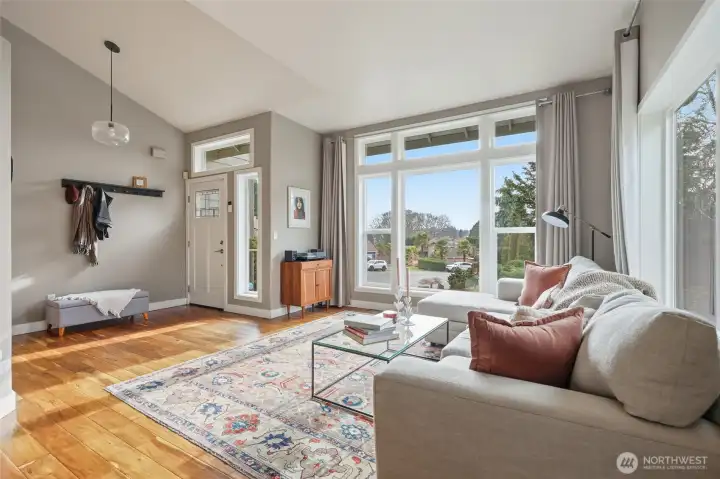 Vaulted ceiling in living room area, plenty of natural light!