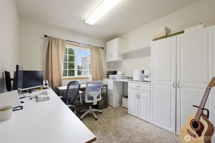 This is a "flex room" on lower floor ... currently used as an office.  It does have access to the "under the stairs closet."