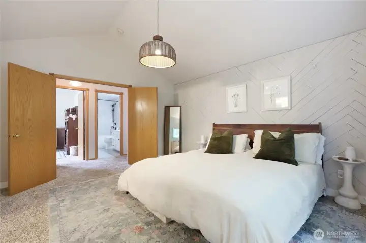 Double door entrance to primary bedroom ...