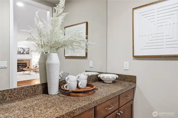 Bulter's bar. Convenient passthrough and extra storage for that fine china or seasonal serving dishes.