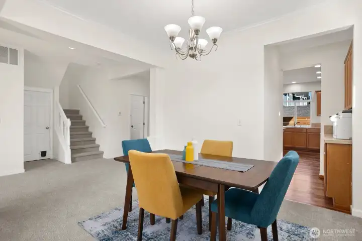 Dining room with view into Butler pantry & kitchen.
