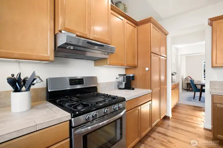 Kitchen & Butler pantry with view into dining / living room.