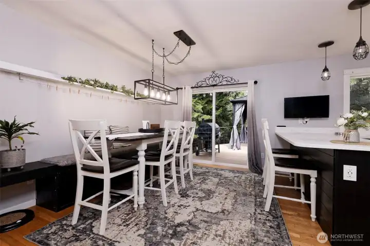 Dining area - table and bench are negotiable in the sale.