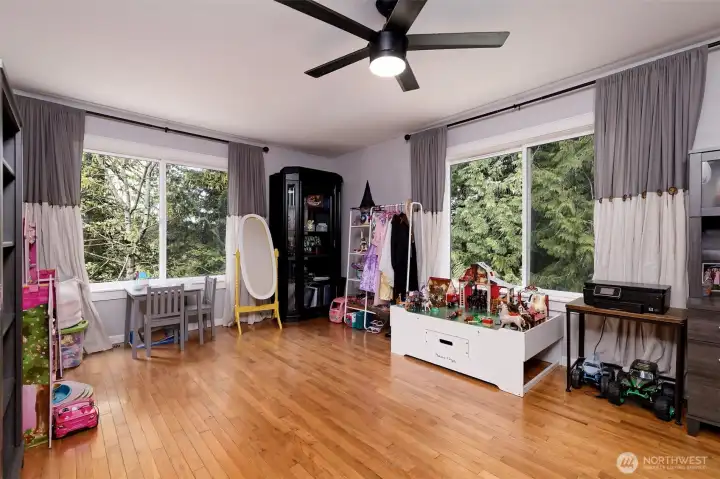 This is the upstairs living room, again with real hardwood floors.
