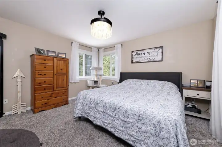 Upstairs large Primary bedroom, walk-in closet, and full bathroom with a soaking tub and step-in shower.