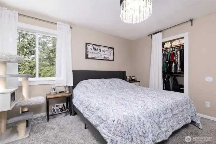 Upstairs Primary bedroom with walk-in closet.