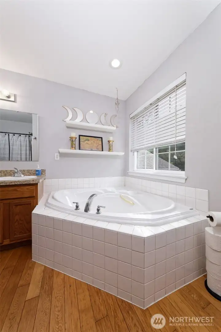 Great soaking tub in the upstairs Primary bathroom.