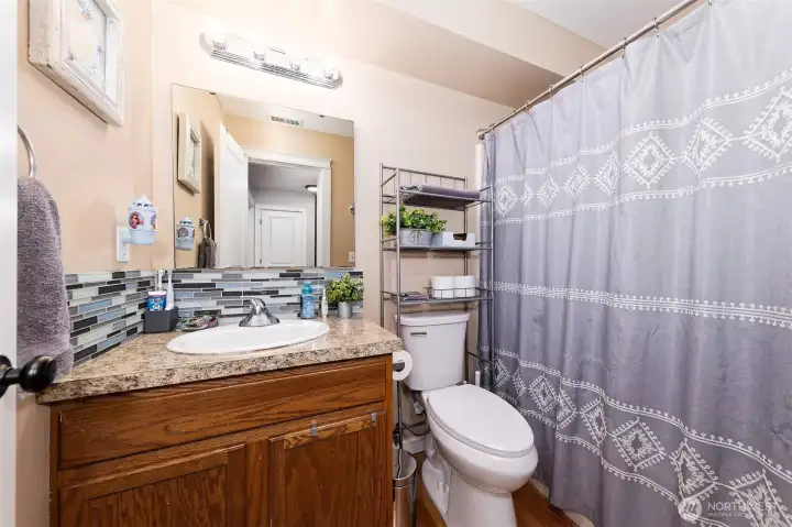Lower level shared full bathroom