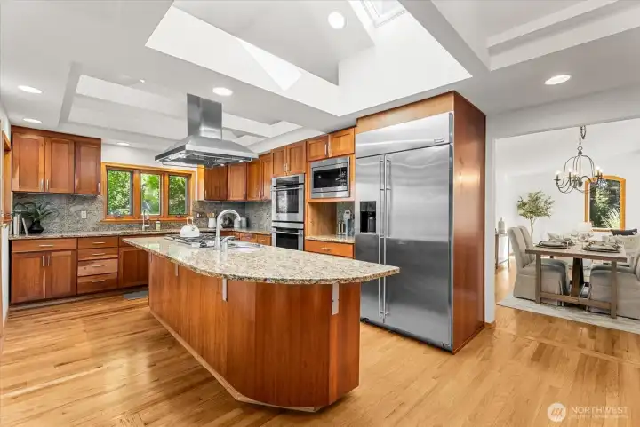 Huge chef's kitchen - Gas cook top in island, double oven, microwave, built-in side by side fridge and a prep sink!