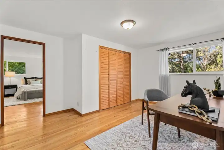 Between the primary bedroom and bathroom is a flex room - use as an office, nursey or a walk in closet area