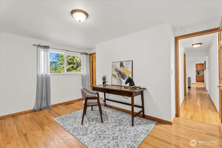 Between the primary bedroom and bathroom is a flex room - use as an office, nursey or a walk in closet area