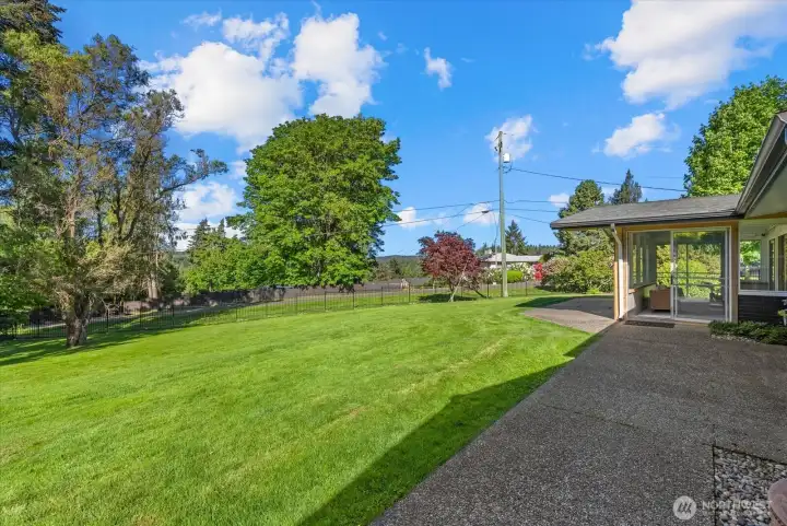 Fully fenced backyard on over a half acre!