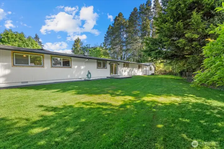 Fully fenced backyard on over a half acre!