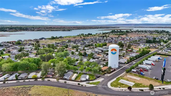 Bottom middle of the photo is where the home is, on the edge of another beautiful neighborhood, and across the street is a basketball park.