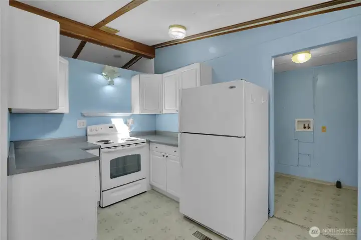 Also included is the stove/range and plenty of cabinetry.