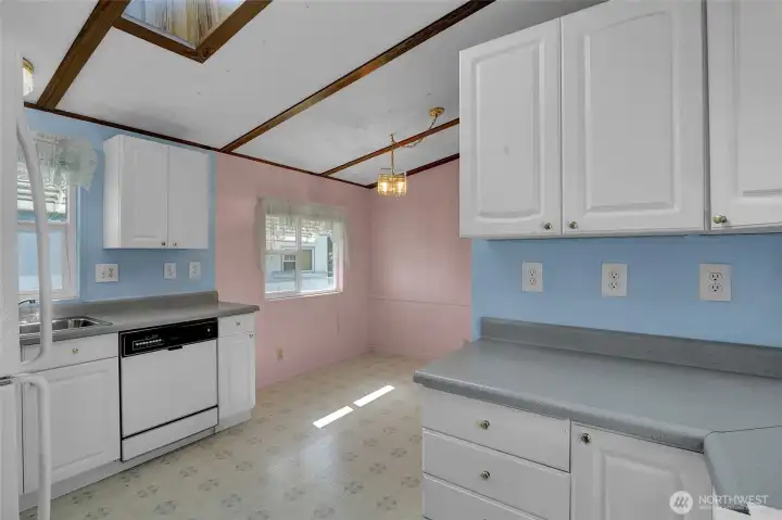 A view back toward the dining room from the kitchen corner.