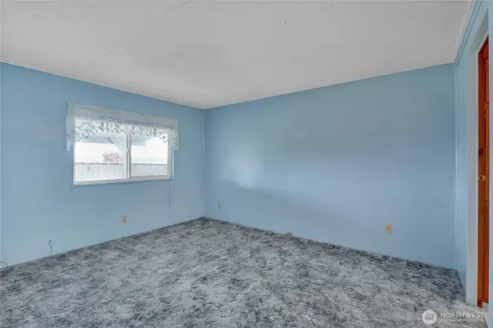 Doesn't this soft blue color just make you want to get some peace and a nap?  This is the primary bedroom.