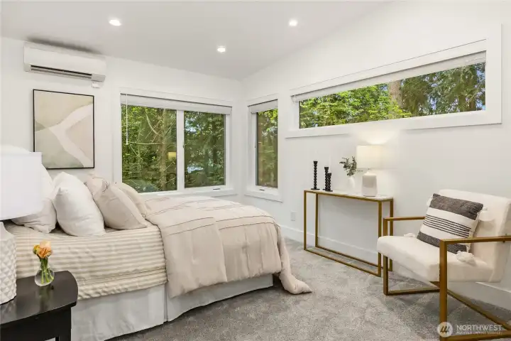 One of two primary bedrooms.