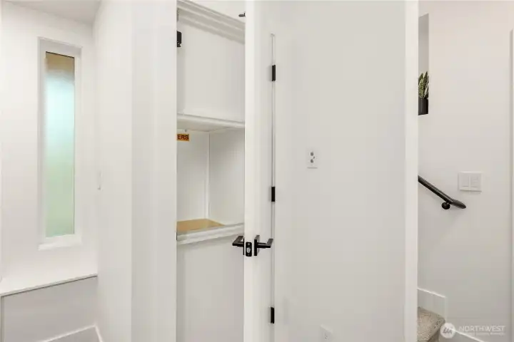 From your 2 car garage is a dumbwaiter to help bring the groceries up!