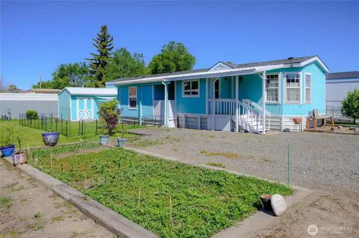 Expansive yard, garden space, and 2 parking spots!