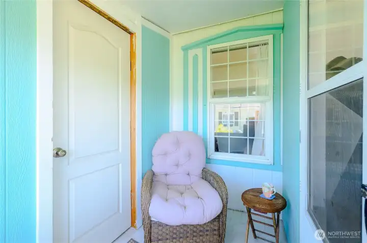 Covered sitting area off of sunroom