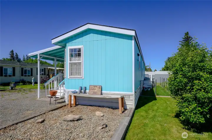 Additional smaller yard area off of back of home