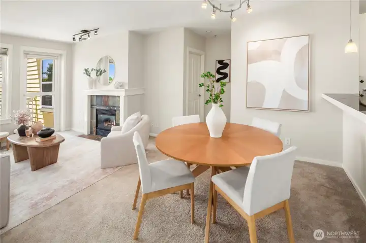 Dining area withs between the kitchen and living room.