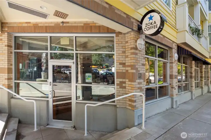 At the corner of the building (sidewalk level) is a wonderful coffee shop.