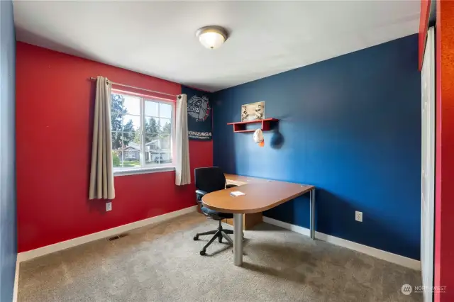 A second guest bedroom located upstairs can also be used for an at home office space.