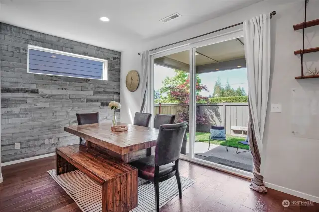 This wonderful dining space has a slider door that steps out to patio extending your entertaining space.