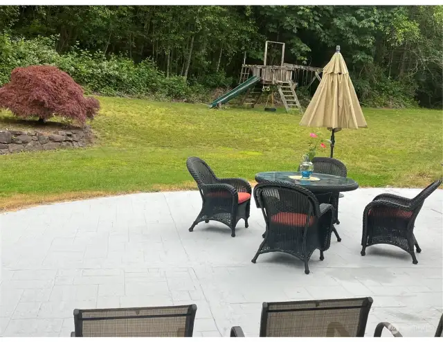 Half round shaped Huge Patio with Stamped Pattern concrete flooring.