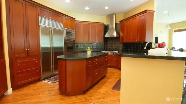 Gourmet Kitchen boasts with Sub-zero Fridge, Viking Cook top, Decor double oven, Bosch Dishwasher, Trash Compressor and a 24 hrs. Hot Water Dispenser,