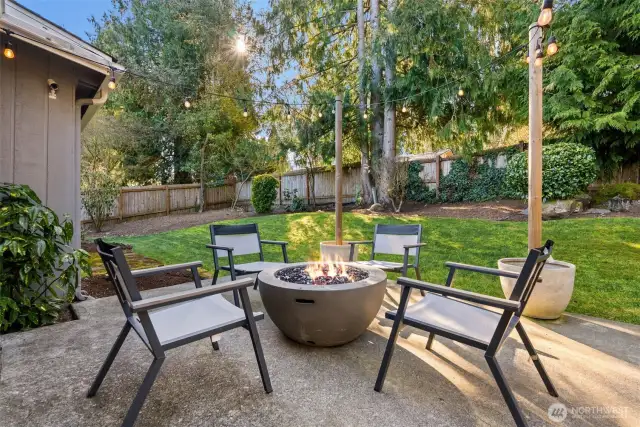 The expansive fenced backyard provides total privacy, creating a peaceful retreat right at home.