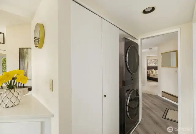 Laundry from kitchen looking toward front hallway and bedrooms
