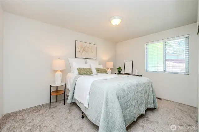 Bedroom #2 is the largest of the 3 Bedrooms with a closet to the right of the window and a door to the hall (Full) Bathroom on the left.