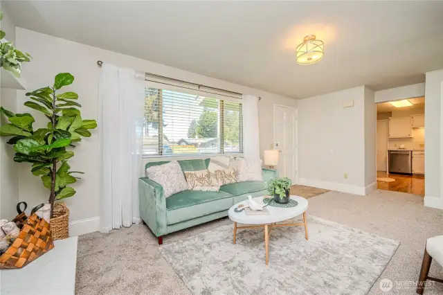 This view shows the proximity to the Kitchen and entry. A closet is to the right of the Kitchen.