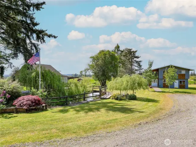 15 Acres & 6 Outbldgs, RV dump hookup to the right of home.