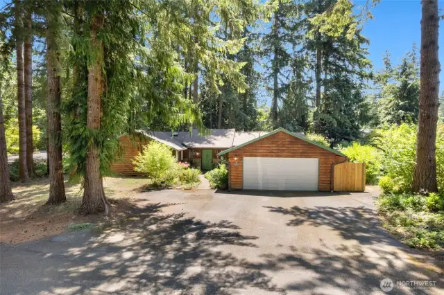 Front yard of home on a corner lot with hole 9 behind home