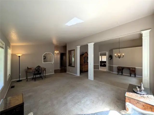 Large Living Rm with lots of natural lighting. #2835 Cooper Point Rd NW, Olympia, WA 98502