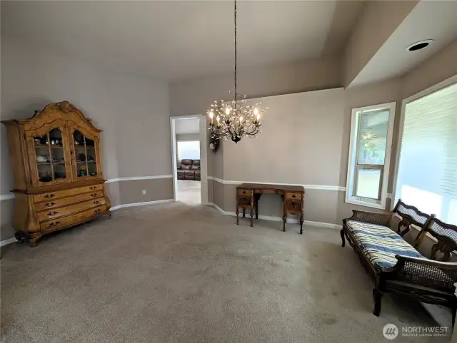 Large Formal dining area between kitchen & Living Rm #2835 Cooper Point Rd NW, Olympia, WA 98502