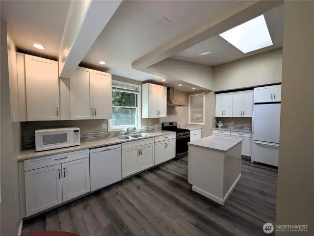 New kitchen with Quartz Counters. #2835 Cooper Point Rd NW, Olympia, WA 98502