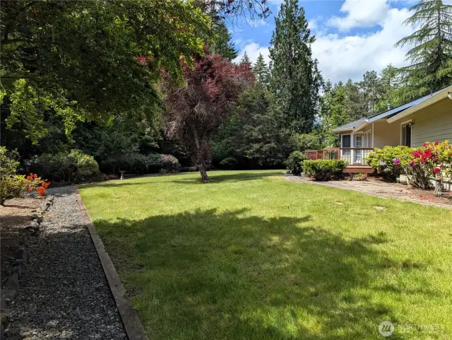Fully enced back yard with gravel pathways and parking. #2835 Cooper Point Rd NW, Olympia, WA 98502