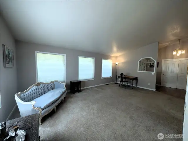 Large Living Rm with lots of natural lighting. #2835 Cooper Point Rd NW, Olympia, WA 98502